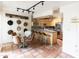 Open kitchen and dining space features stainless appliances, bar seating, and decorative cowboy hats at 7740 E Heatherbrae Ave # 5, Scottsdale, AZ 85251