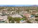 Desert community with pools and mature landscaping on many estate-sized properties at 7829 E Softwind Dr, Scottsdale, AZ 85255