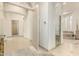Open-concept bathroom featuring natural light, shower, tub, and neutral color palette at 7829 E Softwind Dr, Scottsdale, AZ 85255