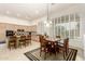 Spacious kitchen with a large center island that seamlessly connects to a dining area with ample seating at 7829 E Softwind Dr, Scottsdale, AZ 85255