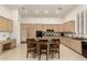 Expansive kitchen with a large island, granite countertops, and ample cabinet space at 7829 E Softwind Dr, Scottsdale, AZ 85255