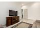 A stylish living room showcases a media center and a cozy seating area, ideal for gatherings at 7829 E Softwind Dr, Scottsdale, AZ 85255
