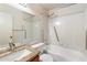 Bathroom with tiled walls, vanity, and shower-tub combination at 10815 N 117Th Pl, Scottsdale, AZ 85259