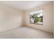 Bedroom with large window providing natural light at 10815 N 117Th Pl, Scottsdale, AZ 85259