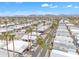 An aerial view of a beautiful mobile home community with well-manicured streets and desert landscaping at 1152 S Sioux Dr, Apache Junction, AZ 85119