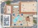 An overhead view of a community pool with an outdoor lounge, shaded seating, and tile roofed buildings at 1152 S Sioux Dr, Apache Junction, AZ 85119