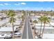 An aerial view of a mobile home community featuring well maintained streets and desert landscaping at 1152 S Sioux Dr, Apache Junction, AZ 85119