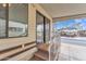 Covered front entry to a mobile home featuring a stairway with decorative railing and a welcome mat at 1152 S Sioux Dr, Apache Junction, AZ 85119