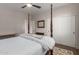 Main bedroom with four poster bed and sliding closet doors at 11919 N 138Th St, Scottsdale, AZ 85259