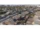 An aerial view showcases a residential area, revealing rooftops, trees, and glimpses of the neighborhood layout at 12926 W Pershing St, El Mirage, AZ 85335