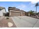 Charming home featuring a three car garage and well maintained landscaping at 12926 W Pershing St, El Mirage, AZ 85335