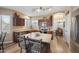 Spacious kitchen featuring a central island and adjacent dining area at 12926 W Pershing St, El Mirage, AZ 85335