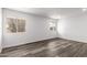 Well-lit bedroom with hardwood floors and natural light at 13110 W Blue Bonnet Dr, Sun City West, AZ 85375