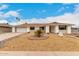 Charming single story home featuring a 2-car garage, desert landscaping, and a welcoming covered entry at 13110 W Blue Bonnet Dr, Sun City West, AZ 85375