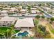 An aerial view of a home with a private backyard pool and desert landscaping at 15146 W Highland Ave, Goodyear, AZ 85395