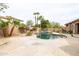 An attractive backyard with a refreshing pool, patio, and vibrant landscaping at 15146 W Highland Ave, Goodyear, AZ 85395