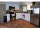 Bright kitchen featuring white cabinetry, stainless steel appliances, and modern countertops at 15625 N 25Th St # 21, Phoenix, AZ 85032