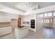 Traditional kitchen with white cabinetry, granite countertops, and center island cooktop at 15644 S 13Th Pl, Phoenix, AZ 85048