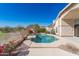 Beautiful pool with manicured landscaping and bright sunny skies at 15644 S 13Th Pl, Phoenix, AZ 85048