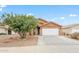 Exterior view of home showing neutral paint, landscaping, and a two-car garage at 1619 E Silverbirch Ave, Buckeye, AZ 85326