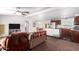 Inviting living room with an open floor plan, seamlessly flowing into the dining area and kitchen at 17258 N 66Th Dr, Glendale, AZ 85308