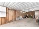 Spacious indoor storage area or workshop with shelving and ample room for projects at 17258 N 66Th Dr, Glendale, AZ 85308