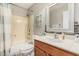 Updated bathroom featuring a vanity with a sink and a shower-tub combination at 17634 W Hearn Rd, Surprise, AZ 85388