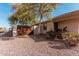 Home exterior view from the front yard with desert landscaping at 17634 W Hearn Rd, Surprise, AZ 85388