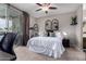 Cozy bedroom featuring a sliding glass door to the outside and modern decor at 1825 W Ray Rd # 2116, Chandler, AZ 85224