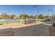 Bikes parked near colorful pickleball courts in a well-maintained community, promoting an active lifestyle at 1825 W Ray Rd # 2116, Chandler, AZ 85224