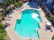 Overhead view of a luxurious community pool with lounge chairs at 1825 W Ray Rd # 2116, Chandler, AZ 85224