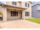 A covered patio overlooking a grassy backyard at 19075 E Pelican Dr, Queen Creek, AZ 85142