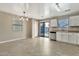 Bright dining area with stainless steel dishwasher, natural light, and tile flooring at 2210 E Caspian Way, San Tan Valley, AZ 85140