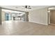 Open concept living room and kitchen area featuring tile flooring at 2210 E Caspian Way, San Tan Valley, AZ 85140