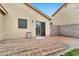 Cozy back patio with brick pavers and sliding door for easy access at 2210 E Caspian Way, San Tan Valley, AZ 85140