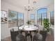 Bright dining area with large windows offering natural light and views of the outdoors at 2416 E Cielo Grande Ave, Phoenix, AZ 85024