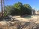 Backyard pool featuring decorative rock and stone as well as patio seating at 2539 E Hazeltine Way, Chandler, AZ 85249