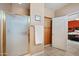 Ensuite bathroom features a glass enclosed shower, a linen closet and adjoining bedroom at 2568 N Armour Ave, Mesa, AZ 85215