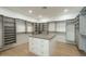 Spacious walk-in closet with custom shelving, drawers, and ample storage space at 2902 E Pierson St, Phoenix, AZ 85016