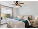 Cozy bedroom featuring a window seat, neutral color palette, and comfortable furnishings at 3023 E John Cabot Dr, Phoenix, AZ 85032