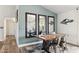 Stylish dining room featuring a modern table, unique decor, and plenty of natural light at 3023 E John Cabot Dr, Phoenix, AZ 85032