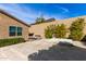 Backyard featuring an outdoor kitchen area, a hot tub, and desert landscaping at 3025 W Night Owl Ln, Phoenix, AZ 85085