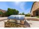 Backyard area with a built-in Bull grill on a sunny day at 3025 W Night Owl Ln, Phoenix, AZ 85085