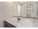 The bathroom features a large vanity with white countertops and a big mirror at 3025 W Night Owl Ln, Phoenix, AZ 85085