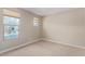 Bright bedroom featuring neutral carpet, baseboards, paint and two windows with cellular shades at 3025 W Night Owl Ln, Phoenix, AZ 85085