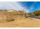 Stoneledge community entrance sign with beautiful stone wall at 3025 W Night Owl Ln, Phoenix, AZ 85085