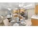 Dining area featuring a modern table setting, open to the kitchen, and bathed in natural light at 316 W Tonopah Dr # 3, Phoenix, AZ 85027