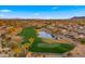 Beautiful aerial view of community golf course and surrounding neighborhood homes at 3400 E Isaiah Ave, Gilbert, AZ 85298