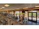 Well-equipped fitness center featuring modern cardio machines and expansive views of the surrounding landscape at 3400 E Isaiah Ave, Gilbert, AZ 85298