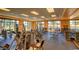 Spacious gym with a wide variety of weightlifting equipment and large windows offering natural light at 3400 E Isaiah Ave, Gilbert, AZ 85298